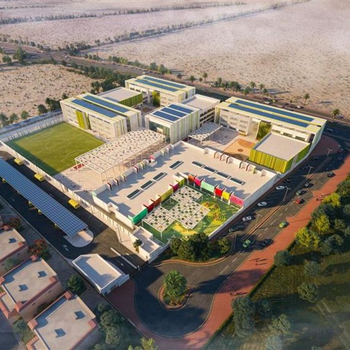 Aerial view of Meydan School with courtyards, sports facilities and surrounding roads.
