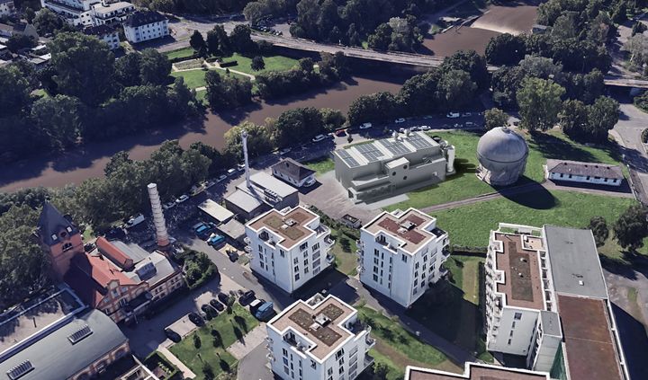 Aerial montage of the planned PowerLahn facility beside the spherical gas holder on the bank of the River Lahn in Gießen.